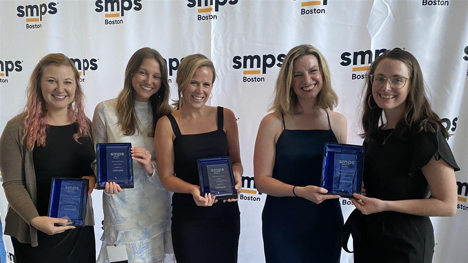 photo of five women holding 2022 SMPS Boston awards