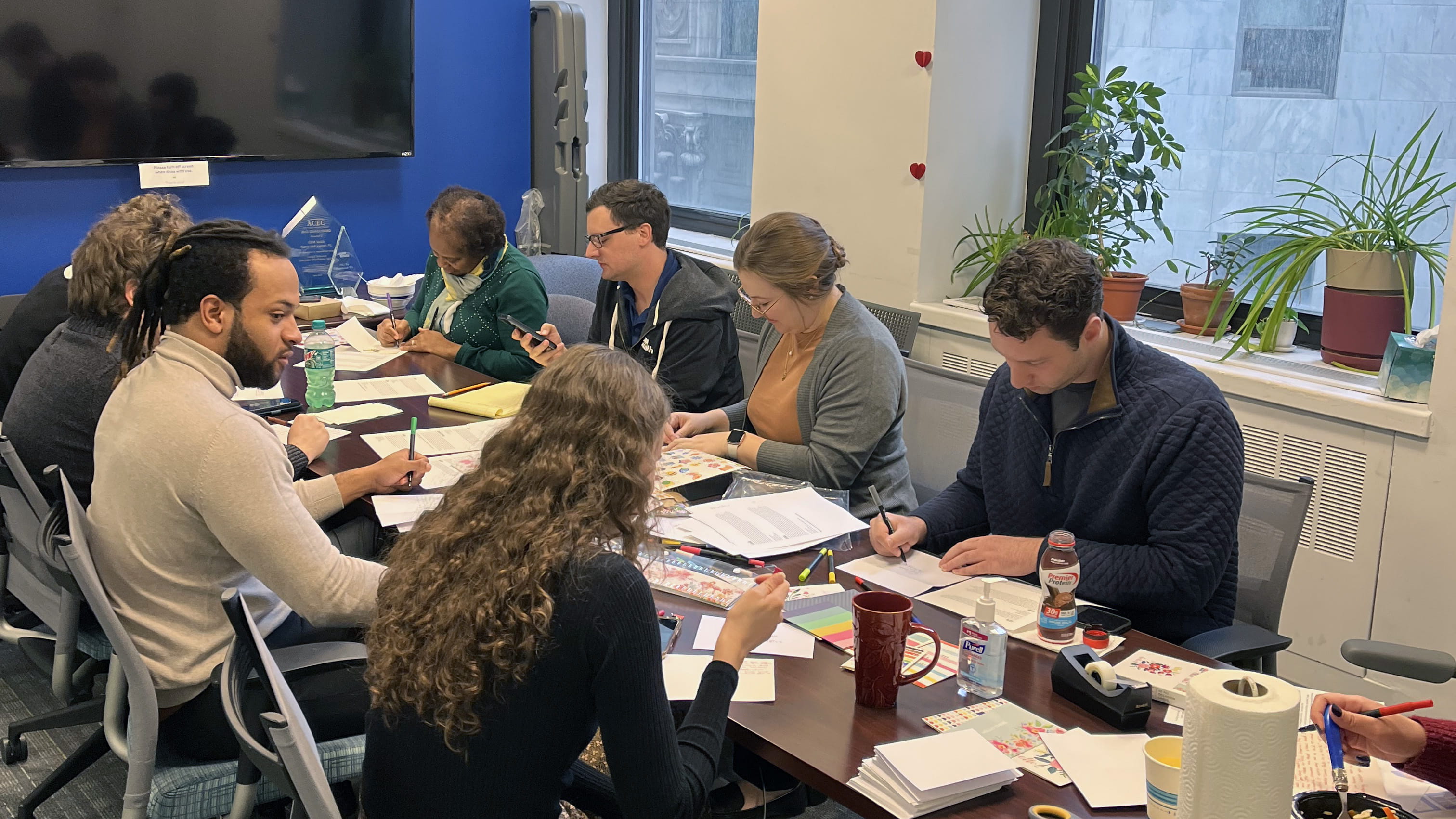 Natalie and seven others at Letters to Elders event