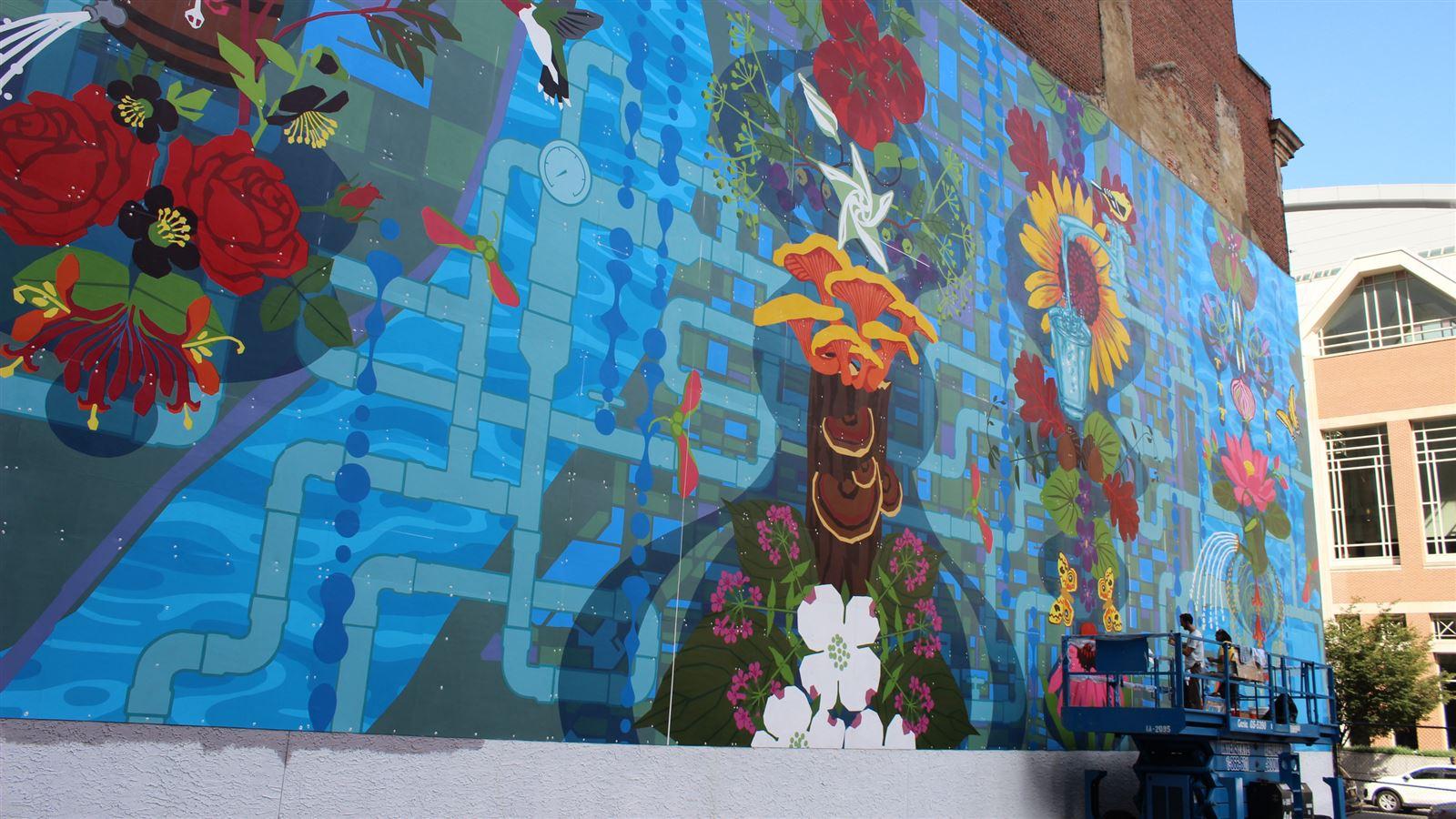 Painters painting a mural in philadelphia