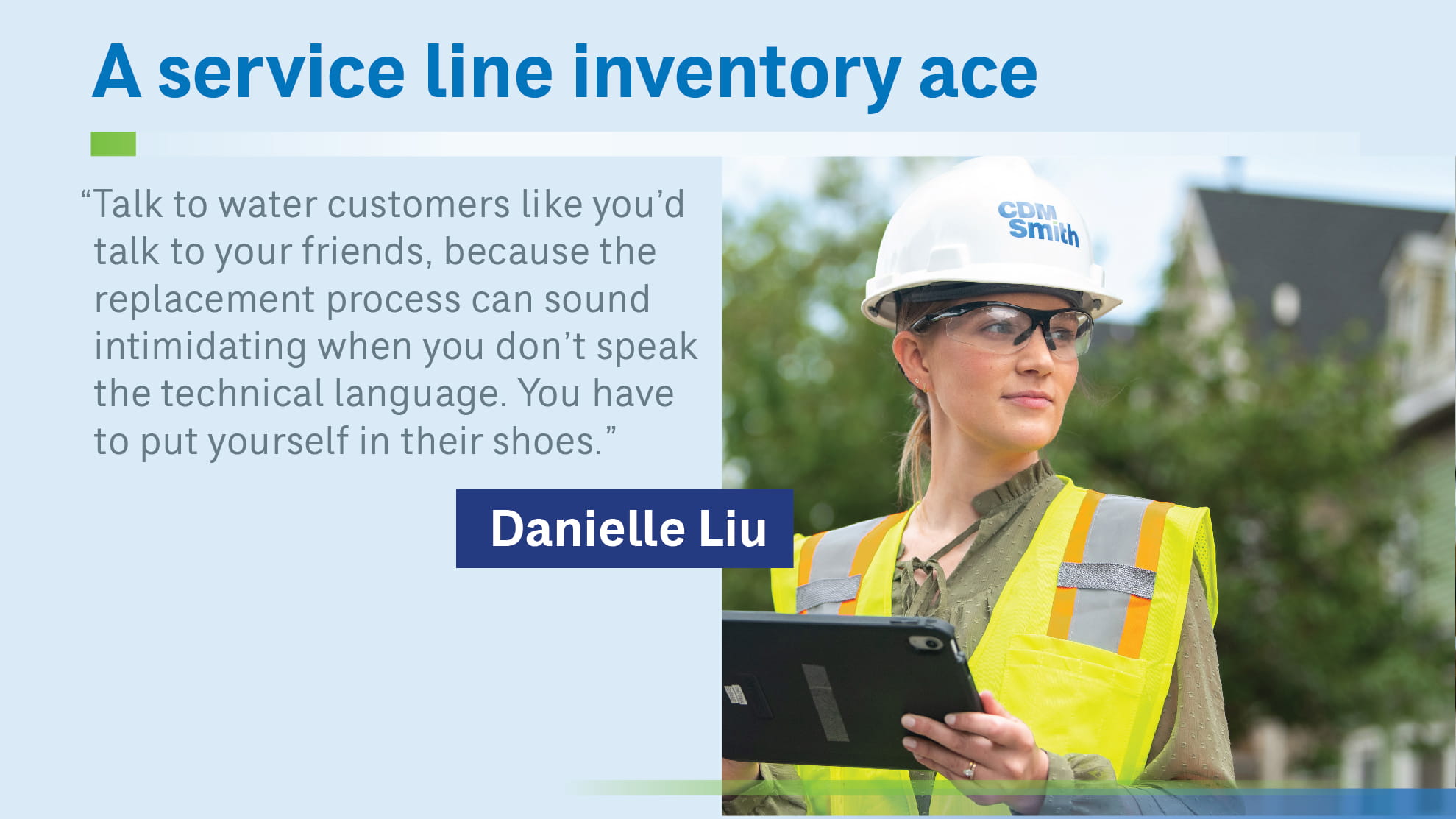 Danielle Liu holding tablet on construction site