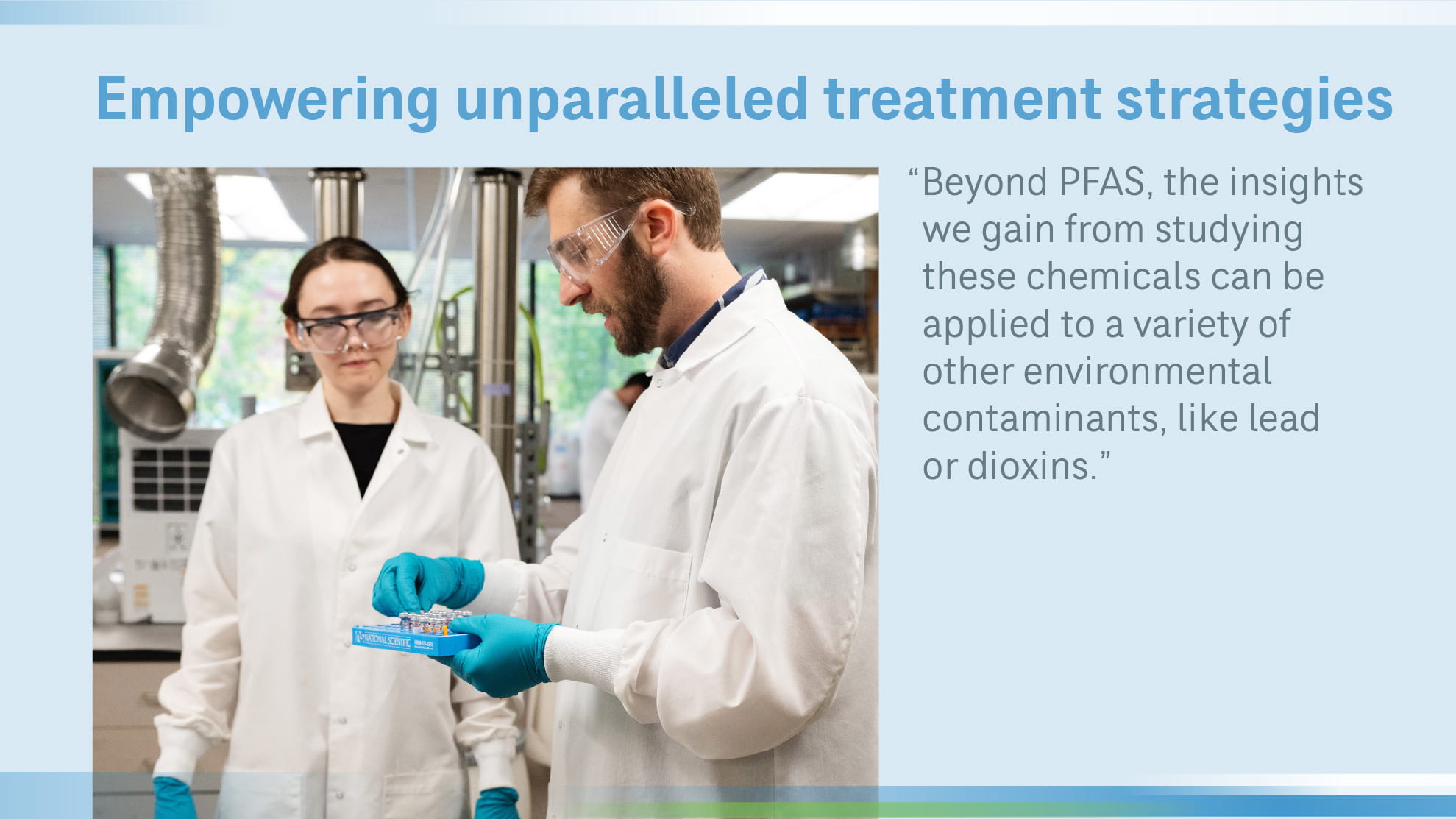 John Stults in lab with a woman in lab coat