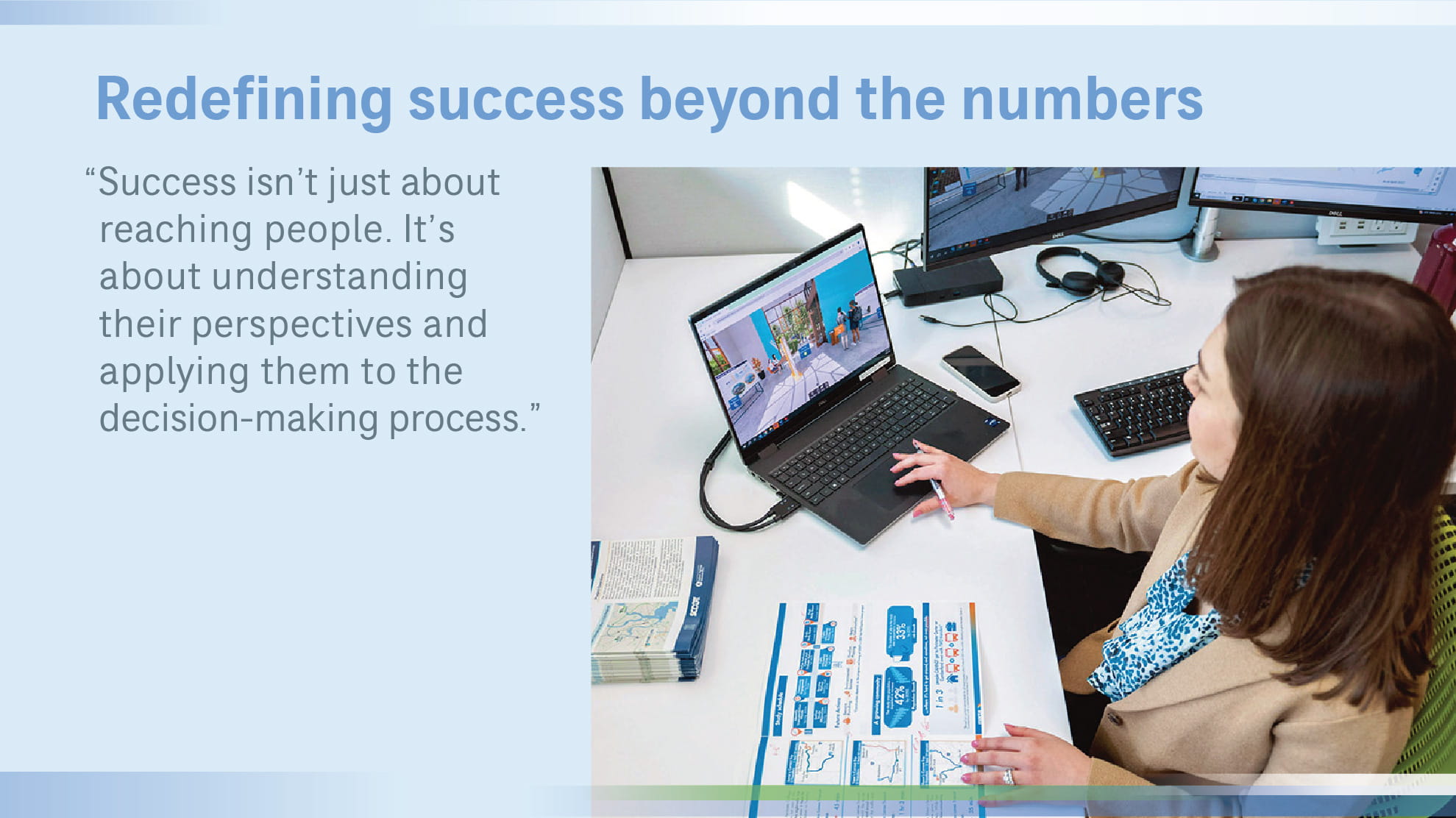 Victoria sitting at desk with computer