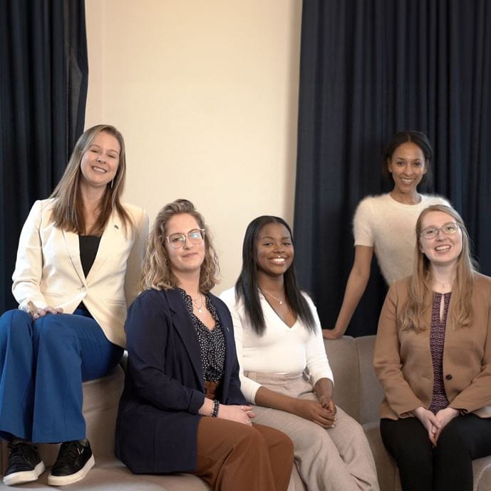 women on couch