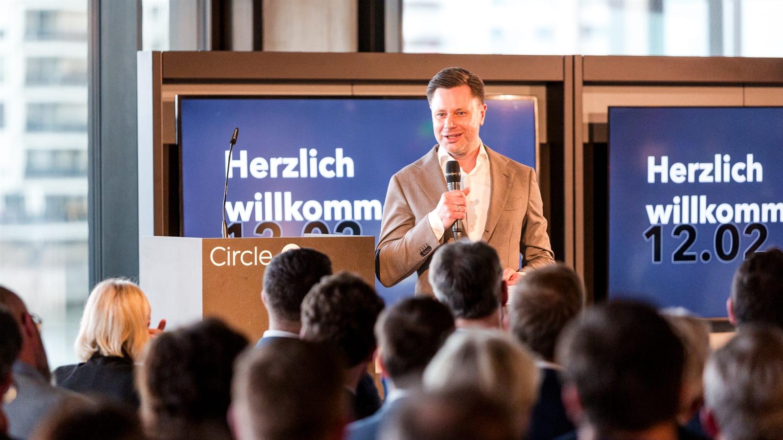 Daniel Immhäuser gives a welcome speech at Circle Cube.