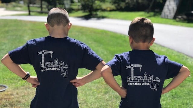 A future scientist and architect wear the CDM Smith t-shirt benefitting Latino STEM Alliance