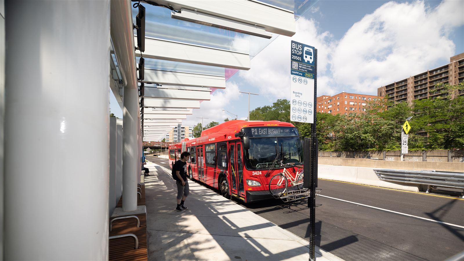 Bus in motion at Negley Station