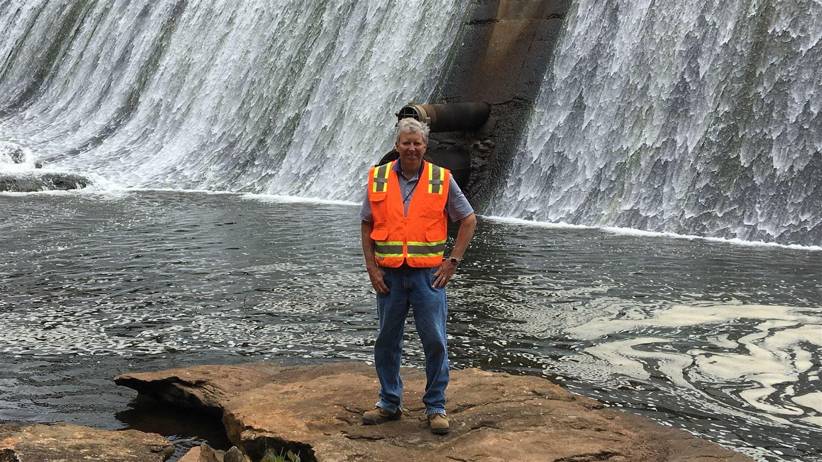 Engineer standing by South Carolina dam