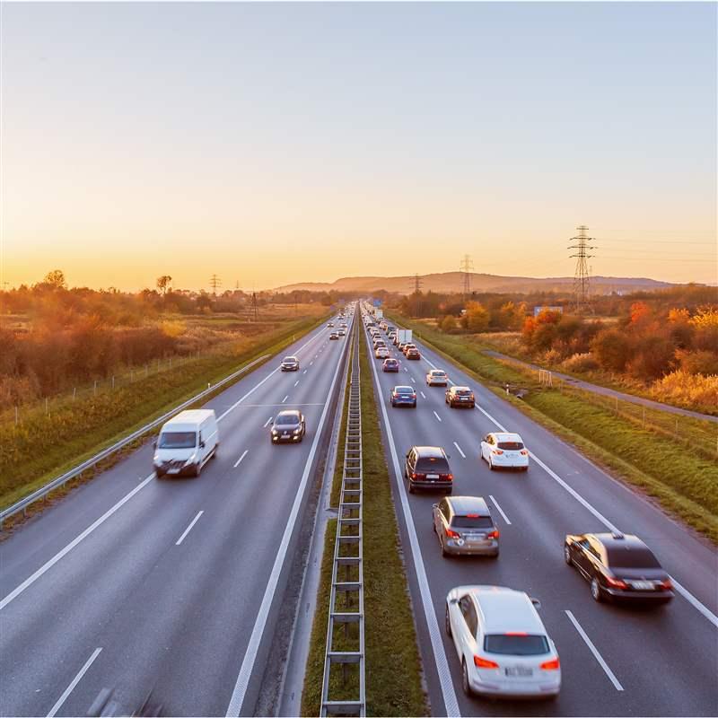 birds eye view of cars driving on a highway