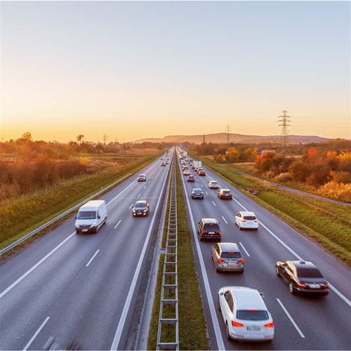 birds eye view of cars driving on a highway